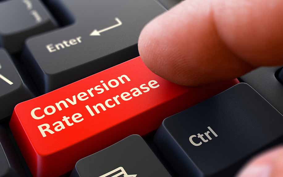 someone pressing a conversion rate increase on a button