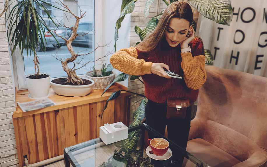 woman taking a photo of her cake for social media - Social Media Marketing